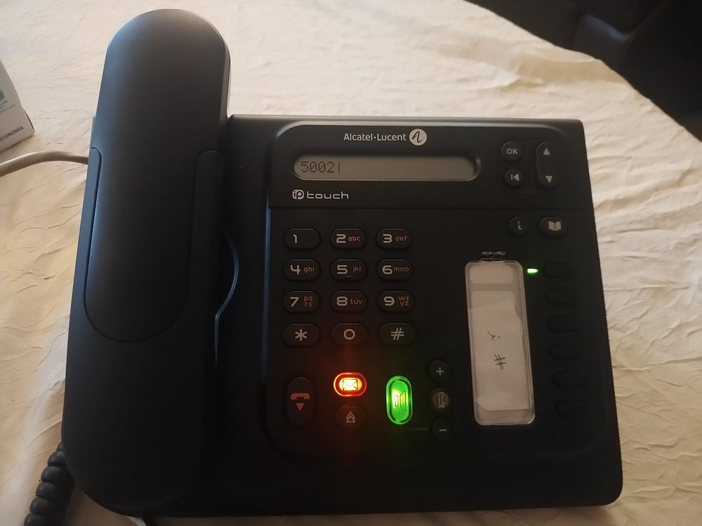 Setting up a VoIP communication between a Raspberry Pi and an IP phone using an Asterisk IP PBX server